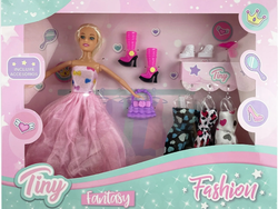 Muñeca Tiny fashion con 3 vestidos