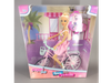 Muñeca con bicicleta