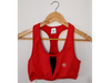 Top clasico coral, con detalles microred talle M