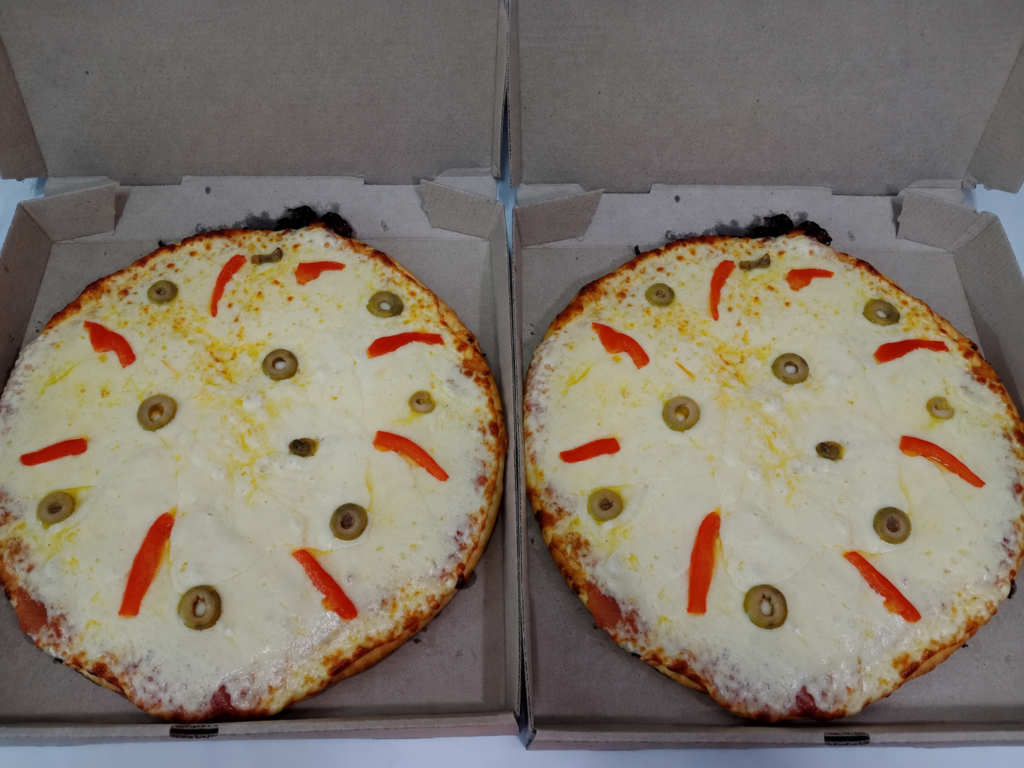 2 pizzas Muzzarella