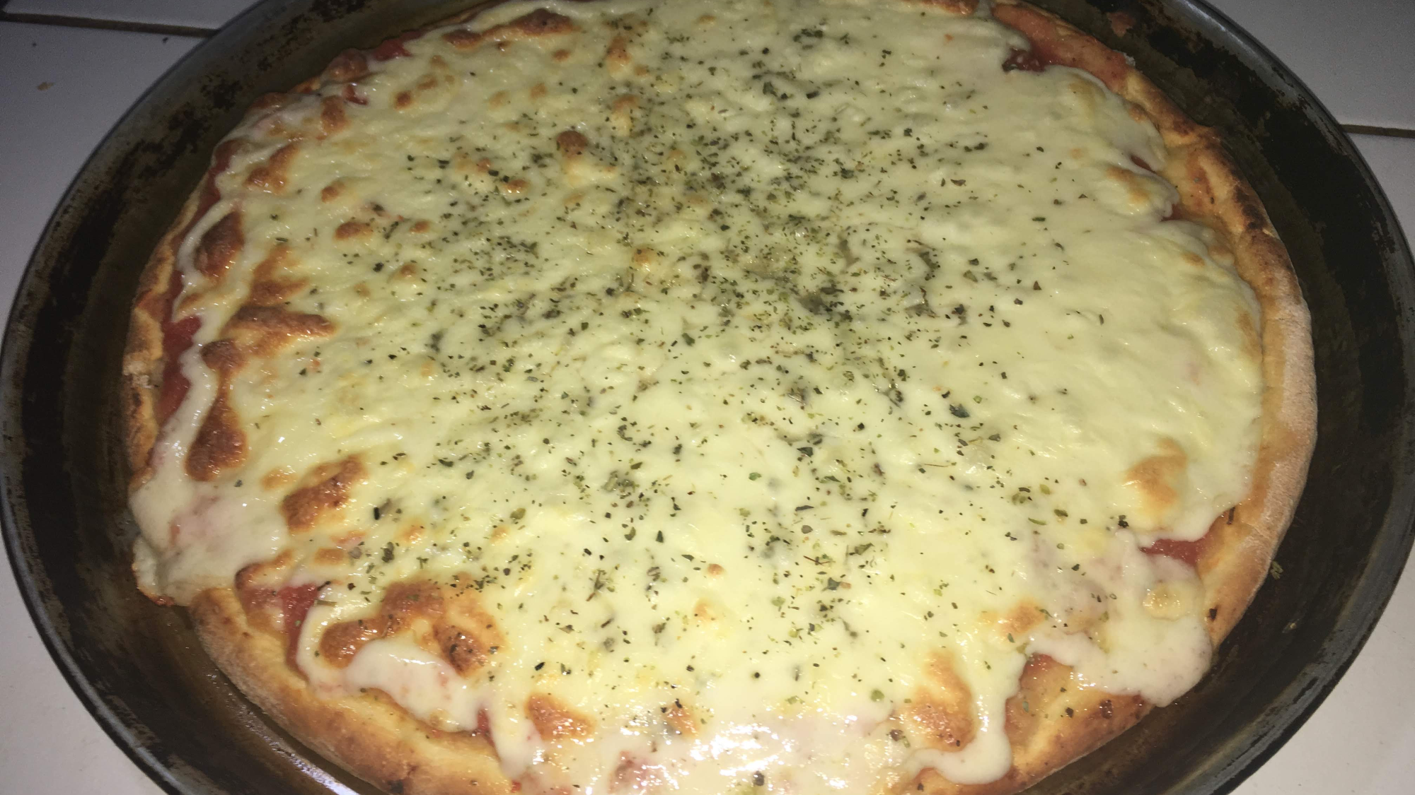 Pizza con quesos