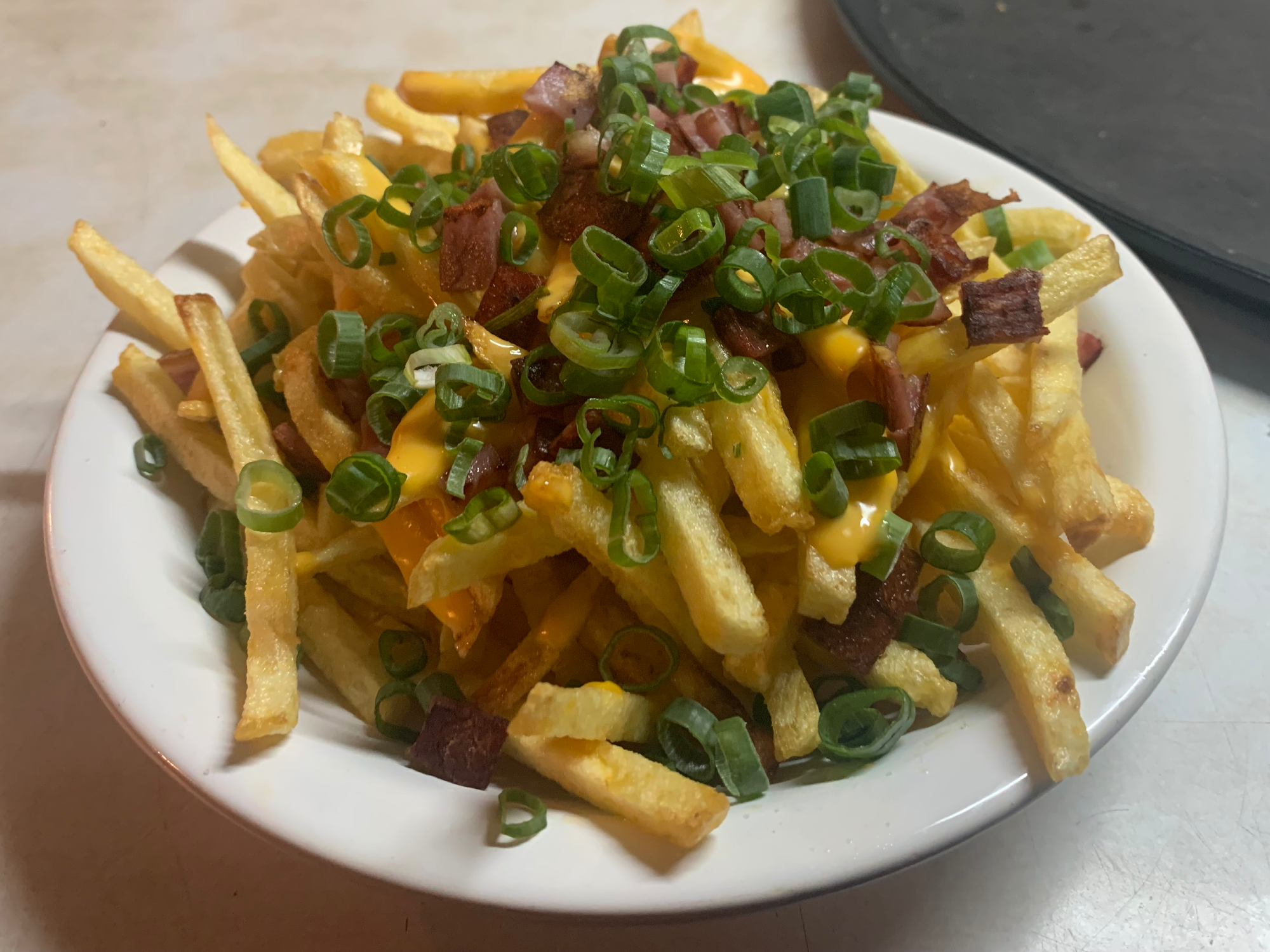 papas fritas con cheddar