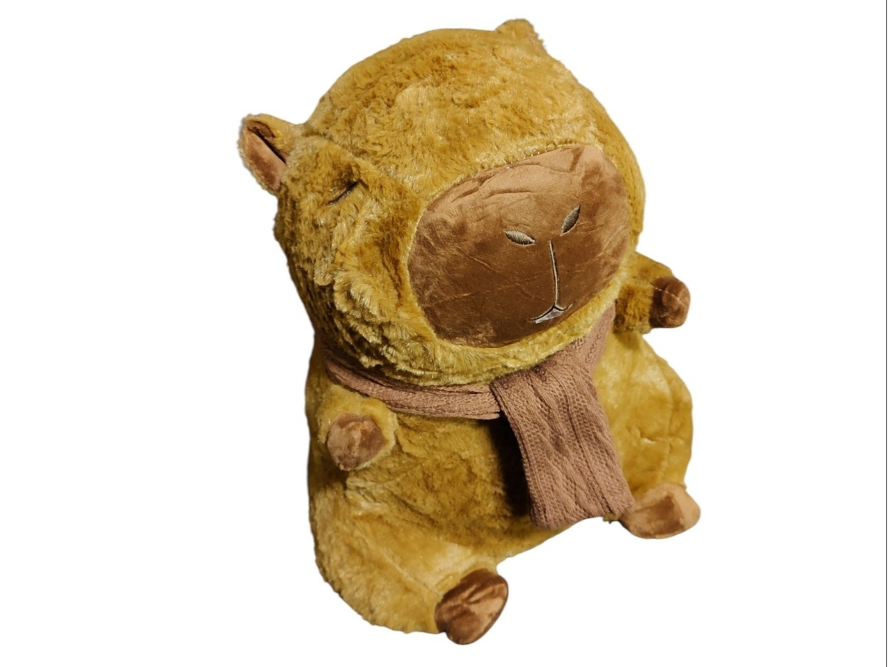 Peluche capibara c/manta y bufanda
