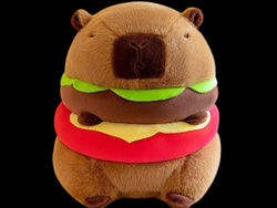 Peluche capibara con manta