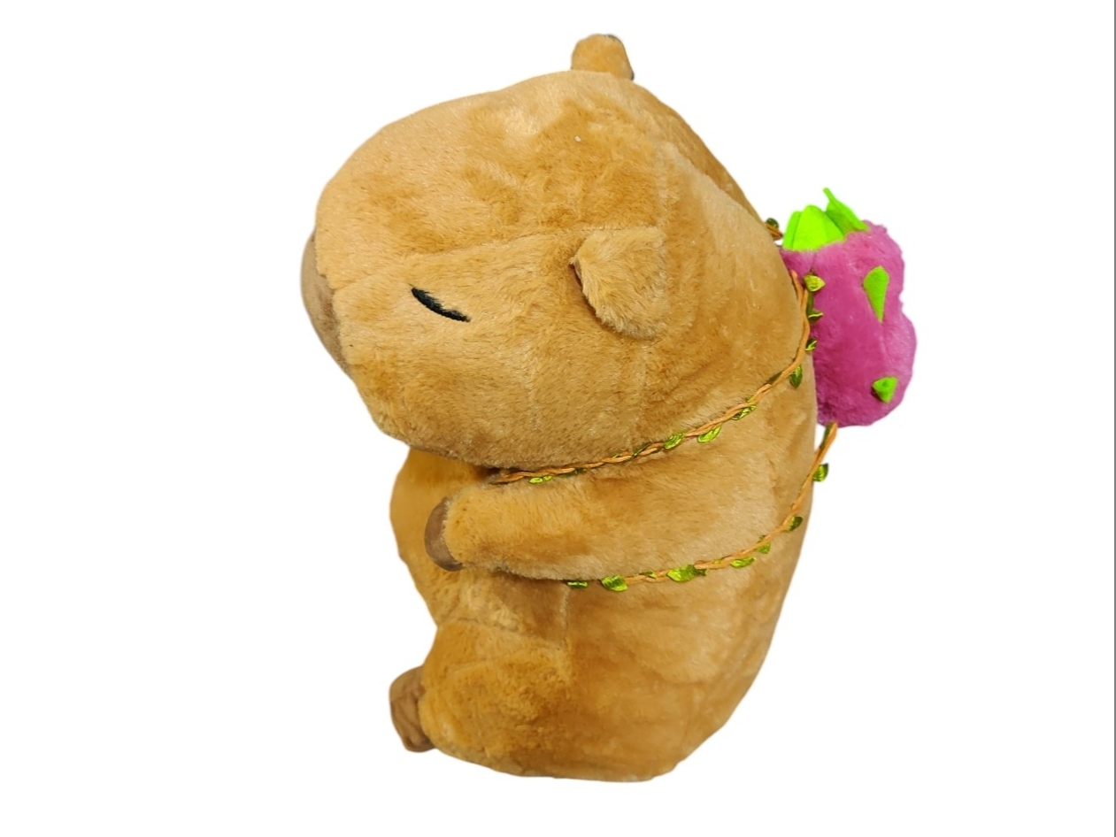 Peluche capibara c/manta y mochila de fruta