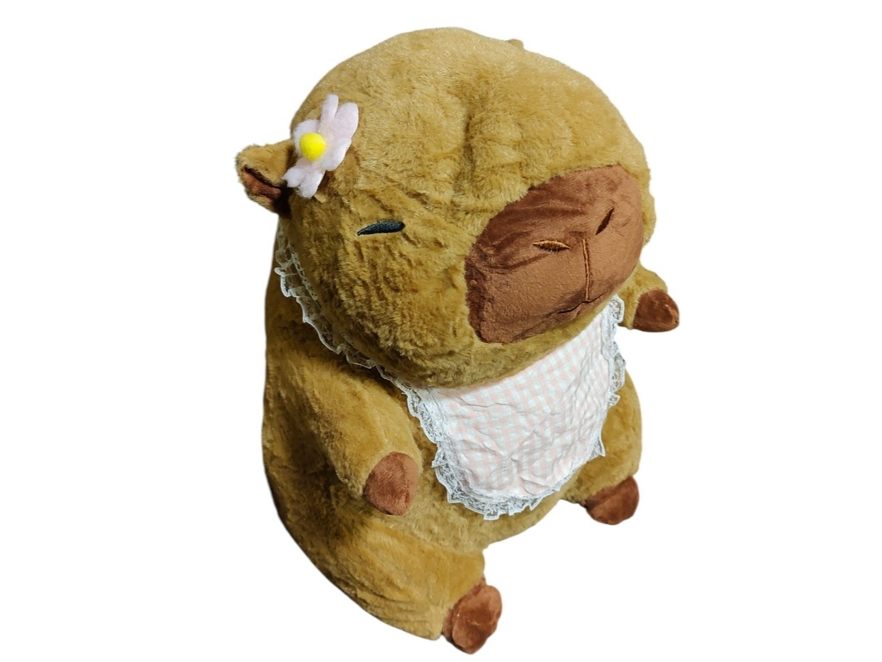 Peluche capibara c/manta y babero