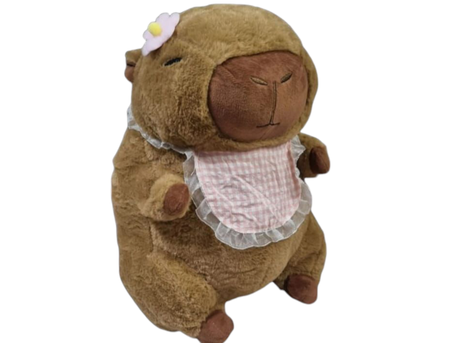 Peluche capibara con manta