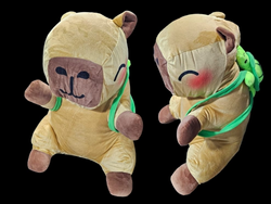 Peluche capibara con manta