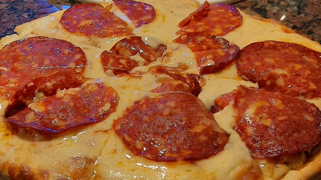 PIZZAS