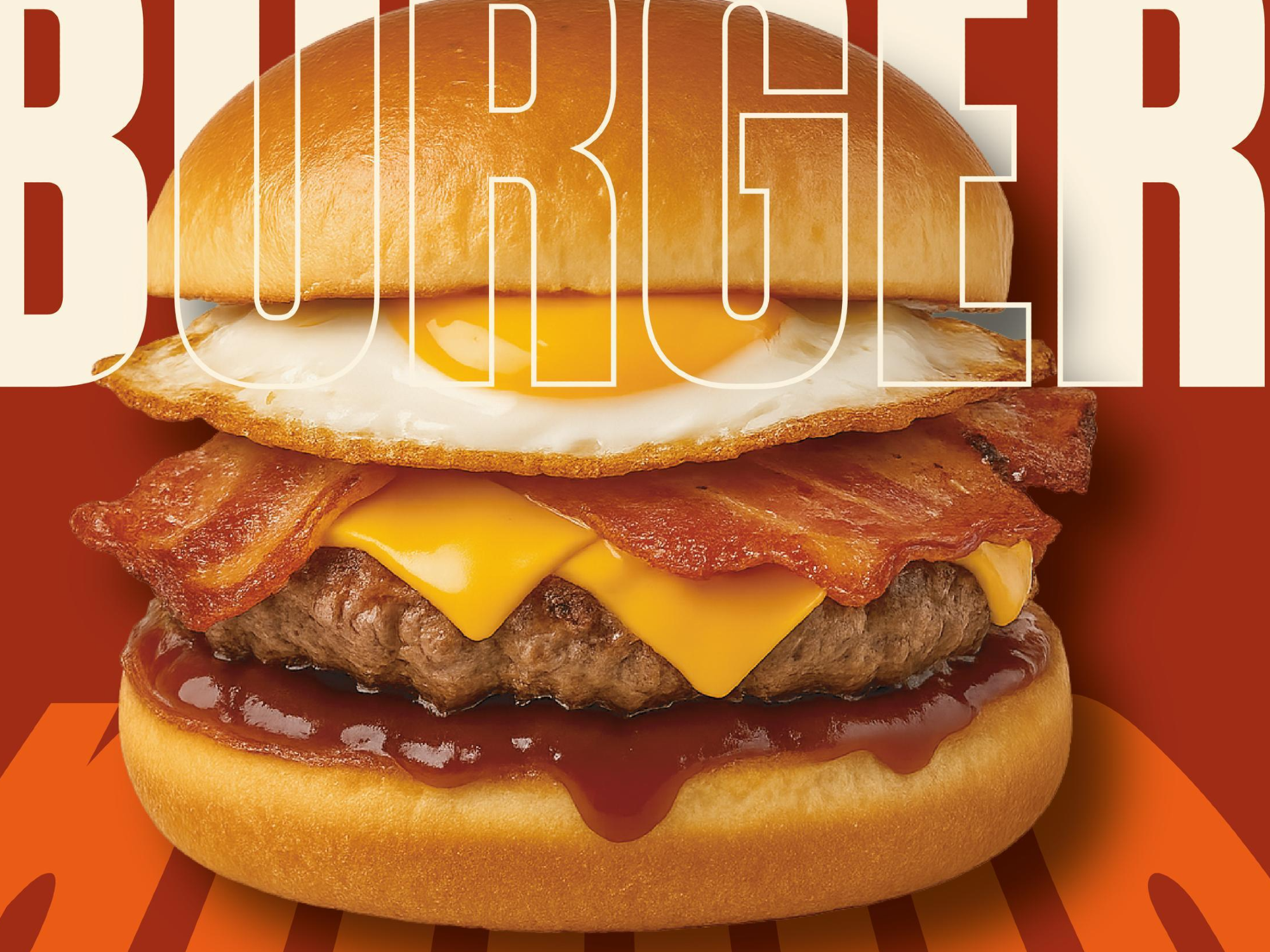 -Pan tipo brioche. -Blend vacuno smasheado de 130g  -Feta de queso chedar  -Huevo estrellado  -Rodajas de panceta  -Barbacoa ahumada