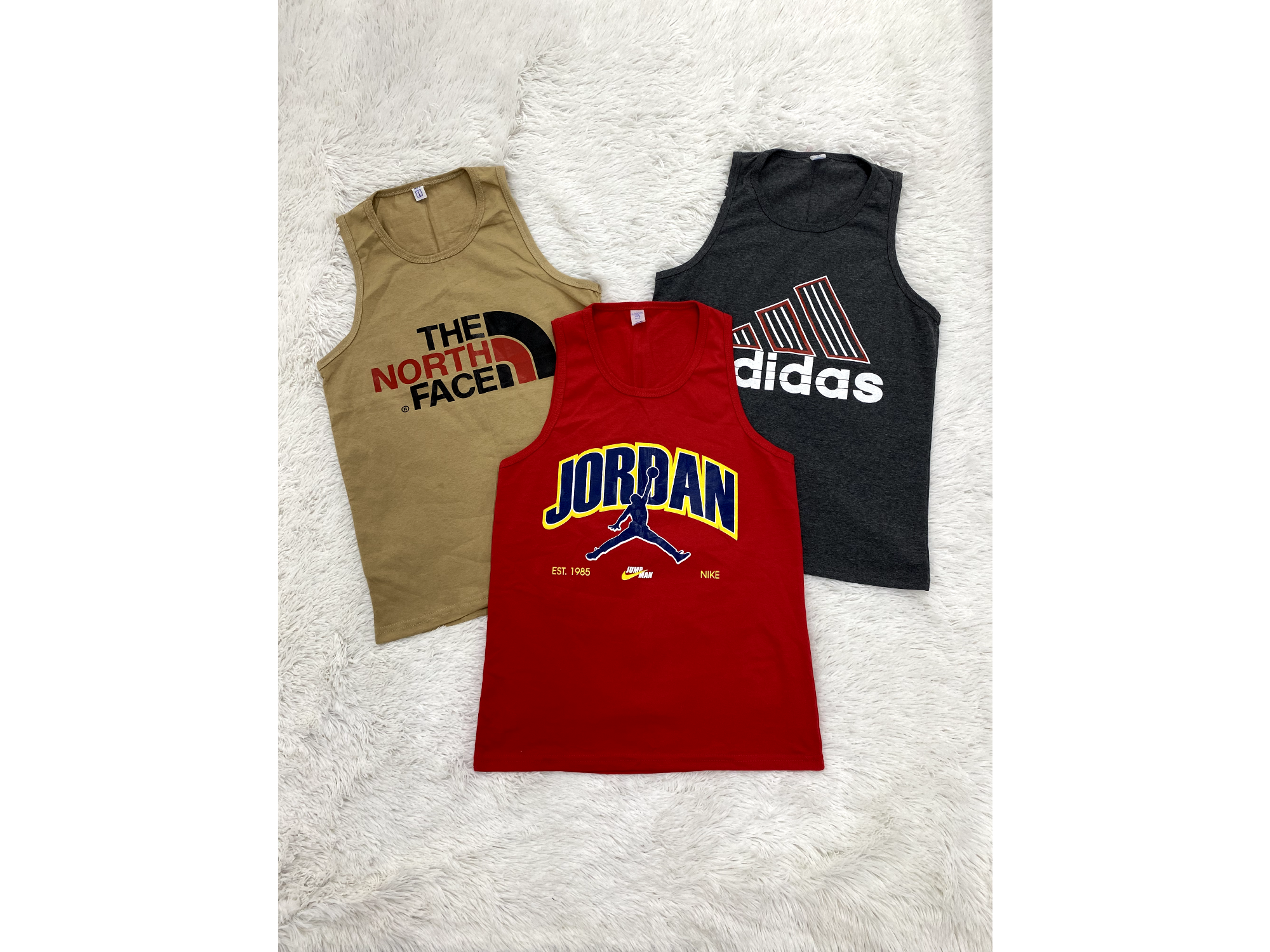 DOCENA MUSCULOSA HOMBRE ESTAMPADAS