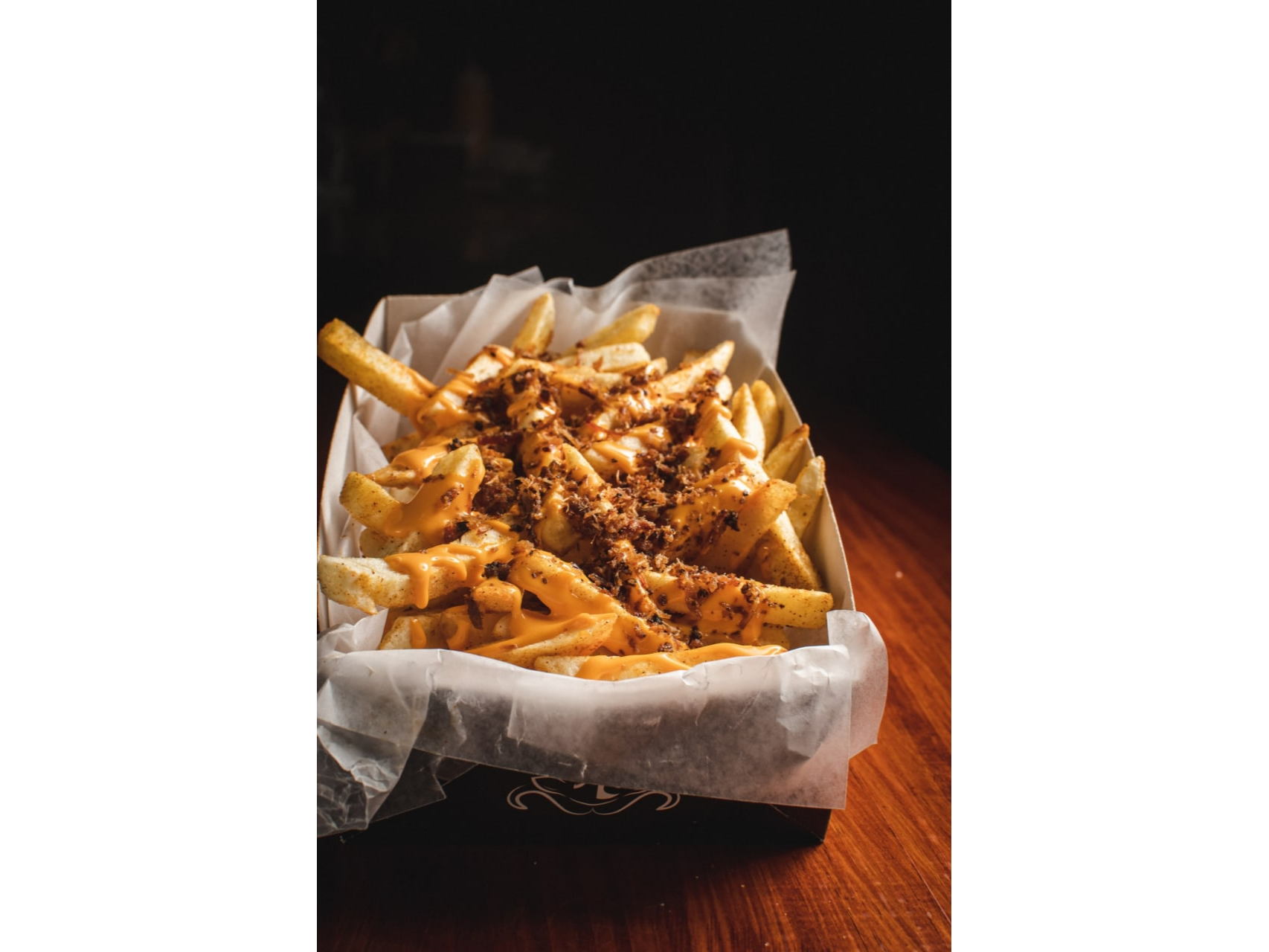 PAPAS CON CHEDDAR Y BACON