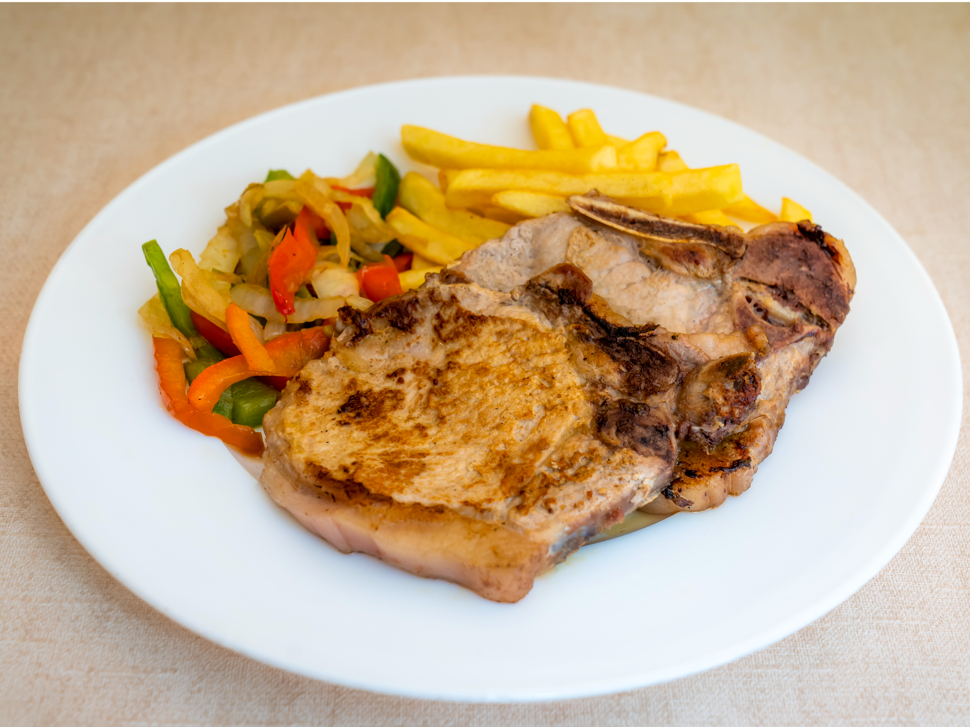 Costeleta de Cerdo con Guarnición