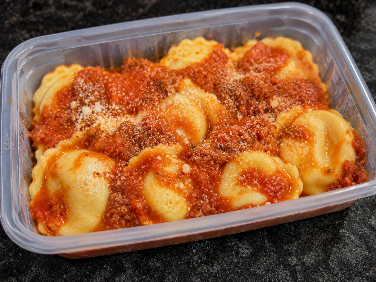 Sorrentinos con Salsa Bolognesa