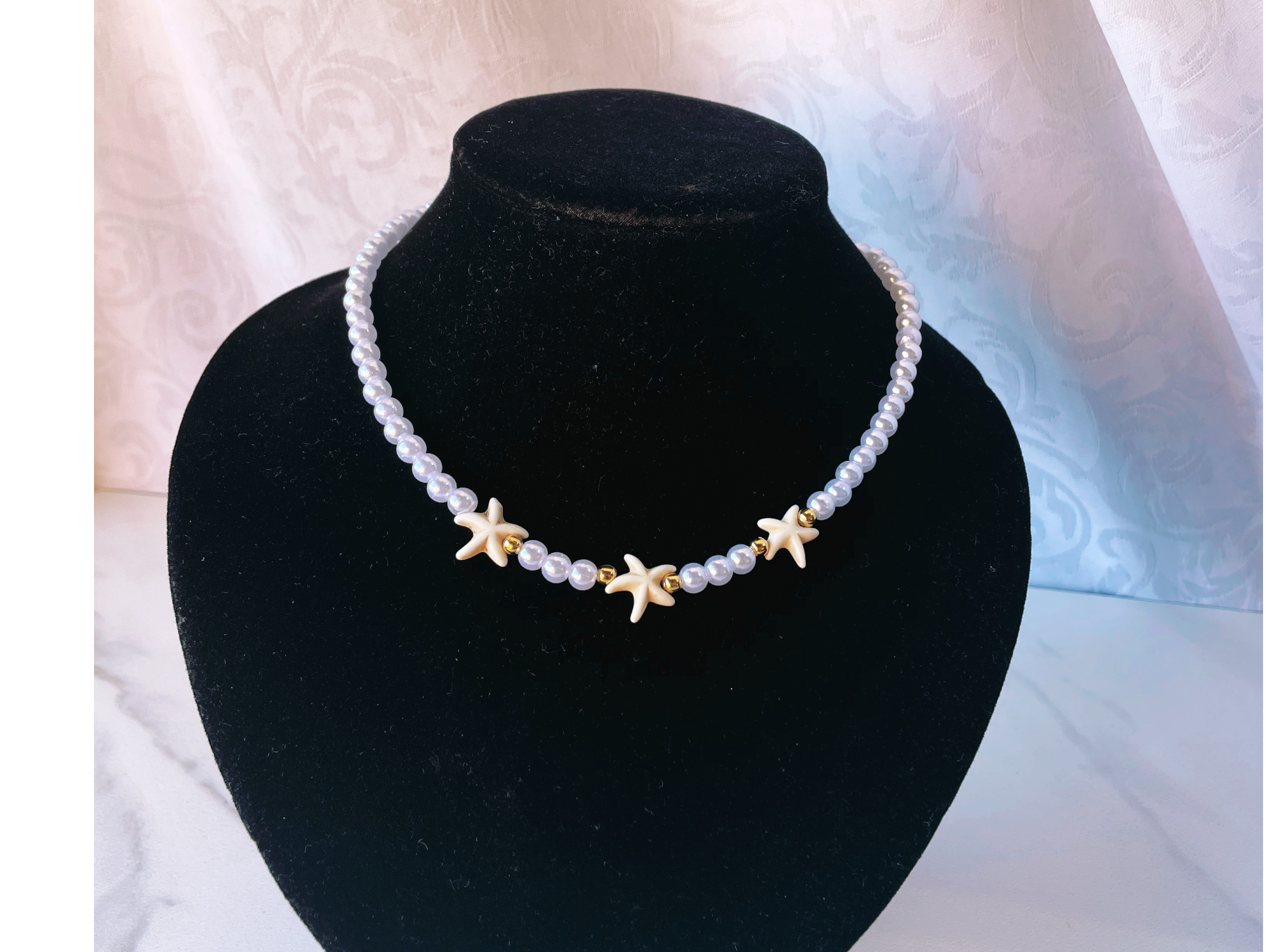 Collar tres estrellas de perlas