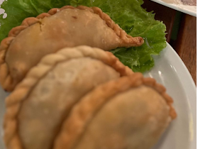 Empanas de carne cortadas a cuchillo