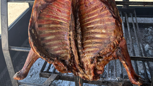 Cabrito a la llama