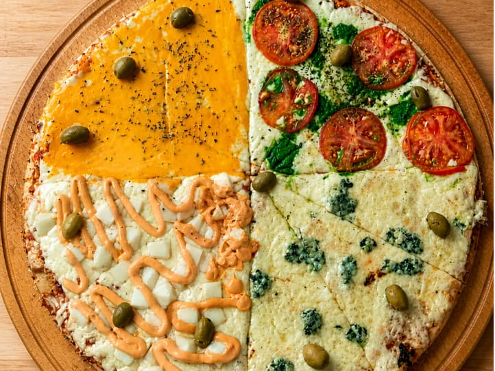 Pizzas 4 estaciones ( 4 sabores)