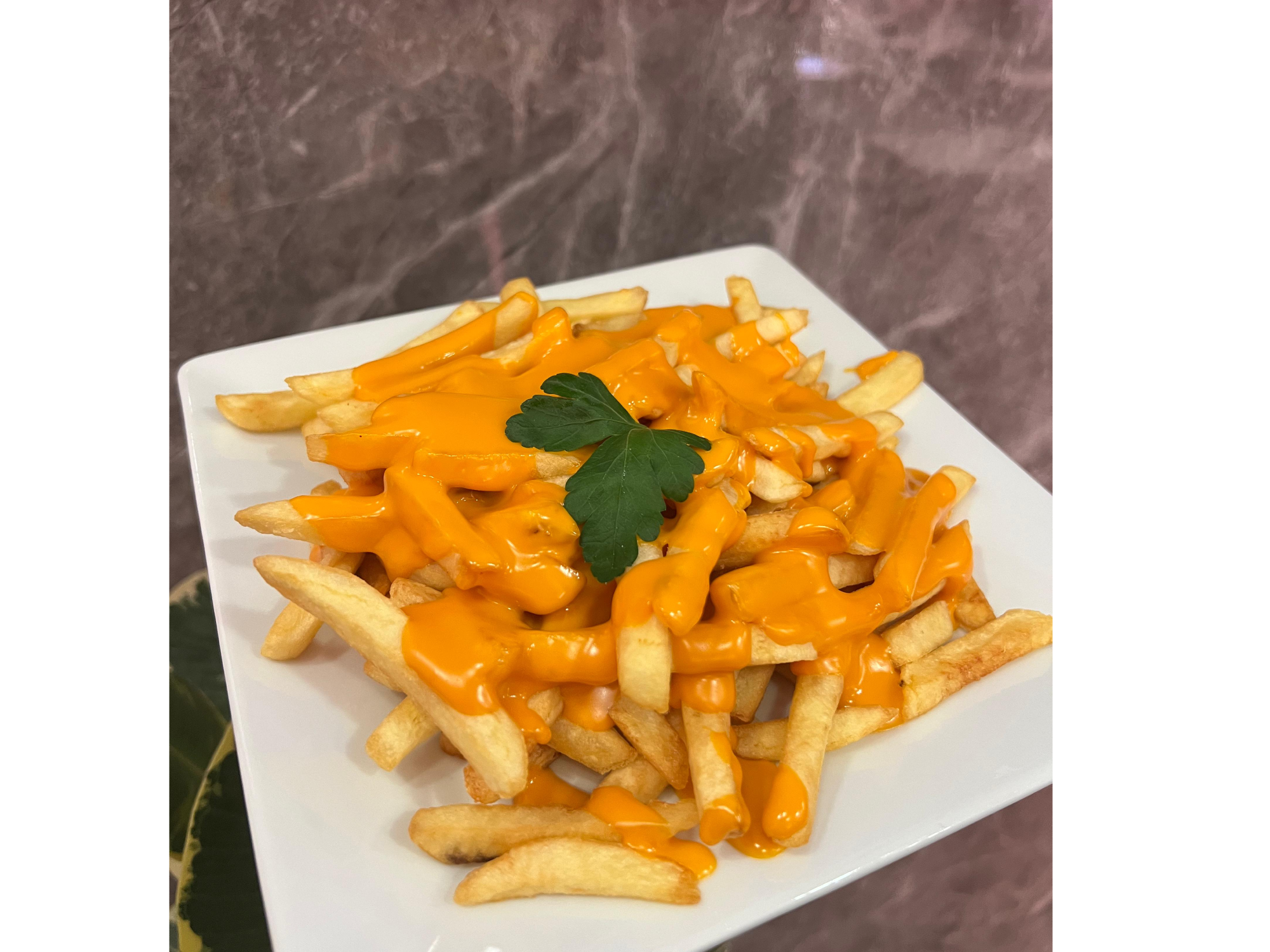 Papas fritas con cheddar