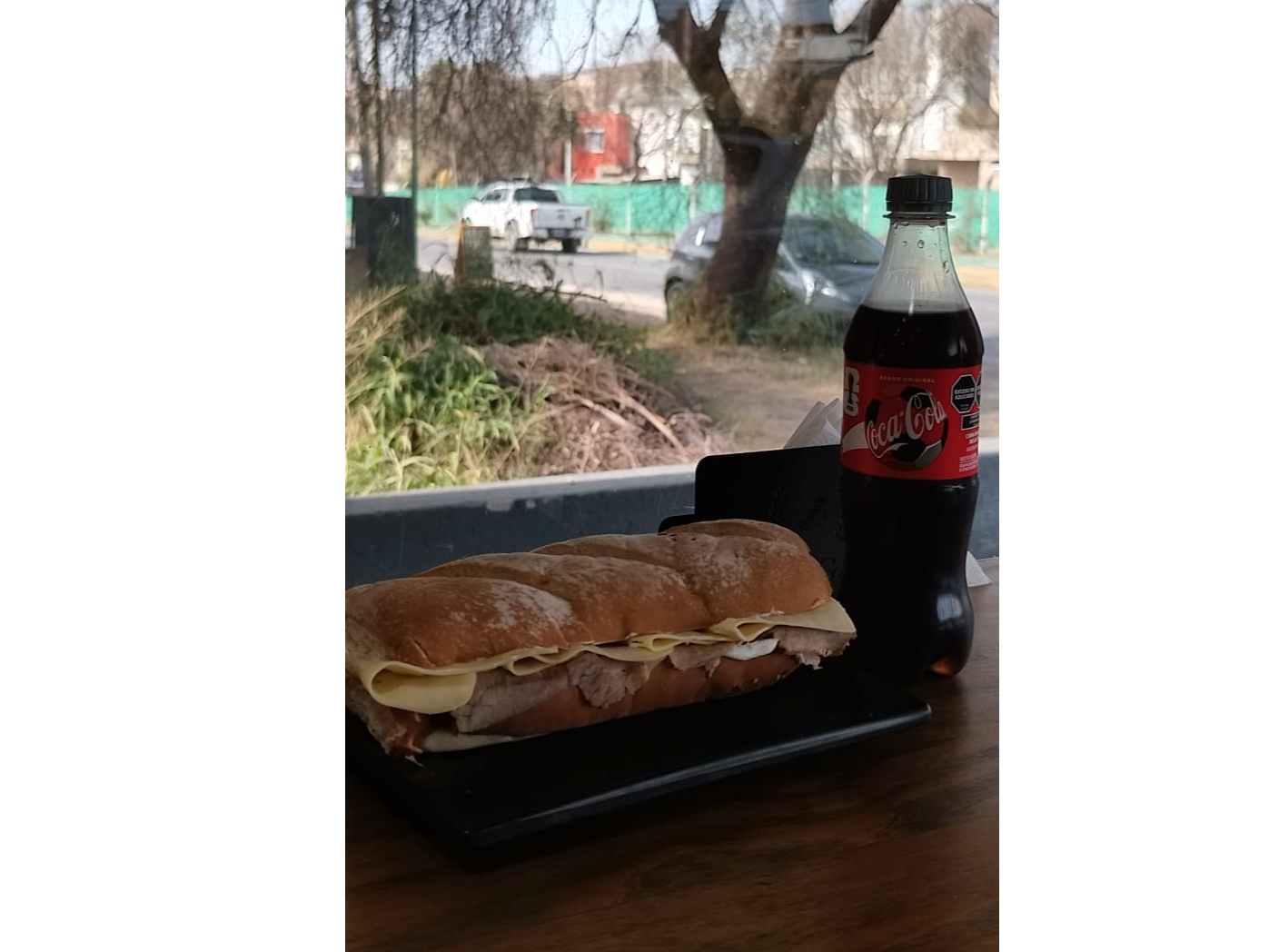Promo Sandwich pan de campo xl  ternera y queso + gasesosa Pepsi