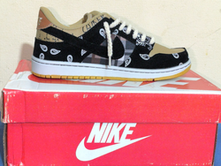 Zapatillas marca Nike color marrón y negras N° 35, 36, 37, 38.