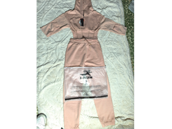 Conjunto deportivo marca Rum de Lycra campera y pantalón talle S, M y talle XL