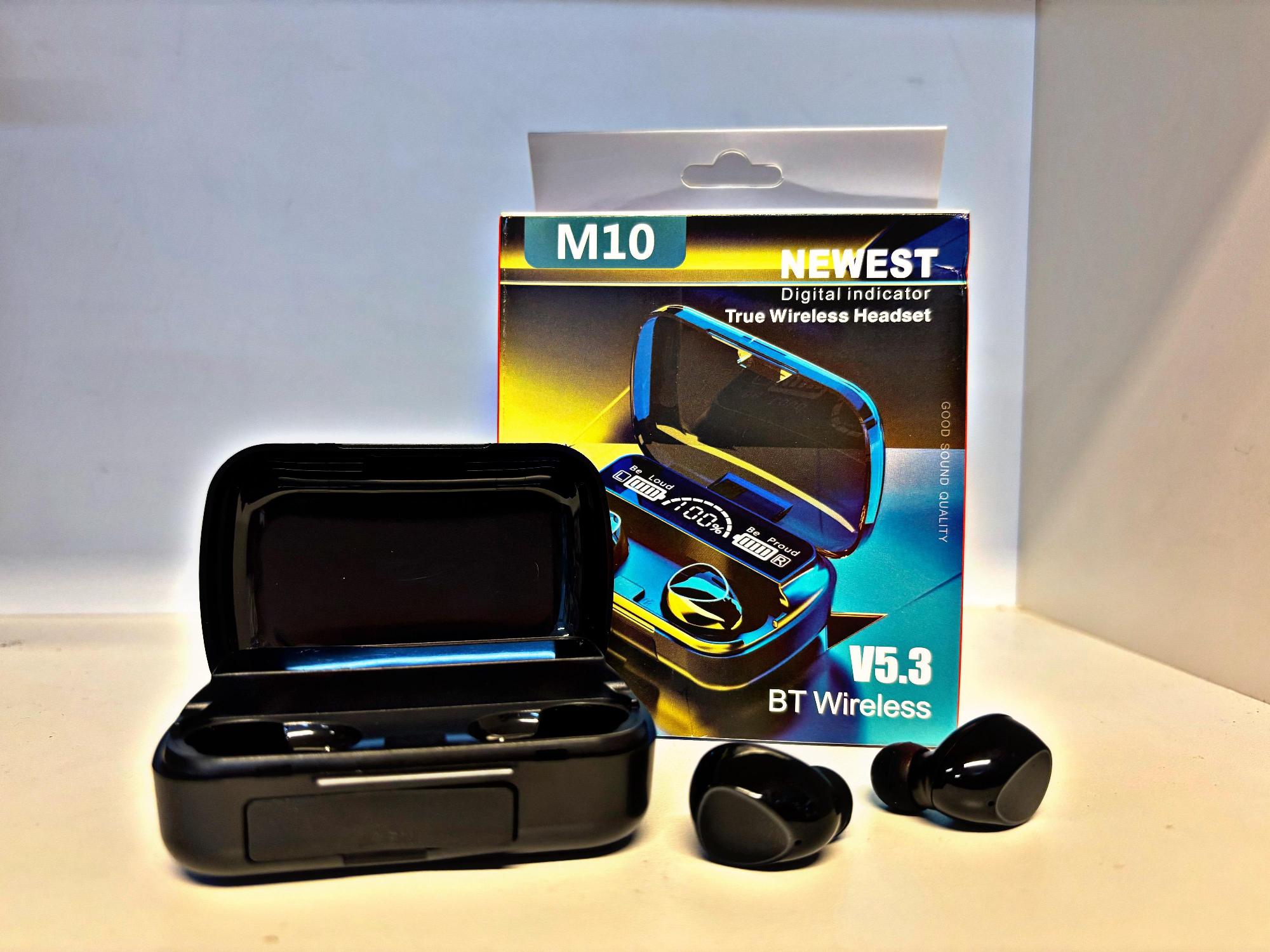 Auricular M10 en caja roja