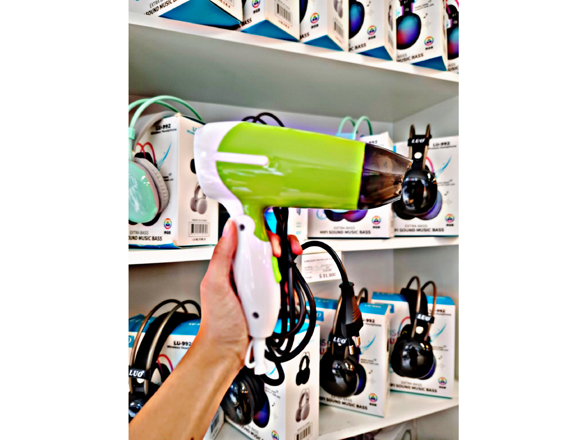 Secador de pelo de viaje "kemey"