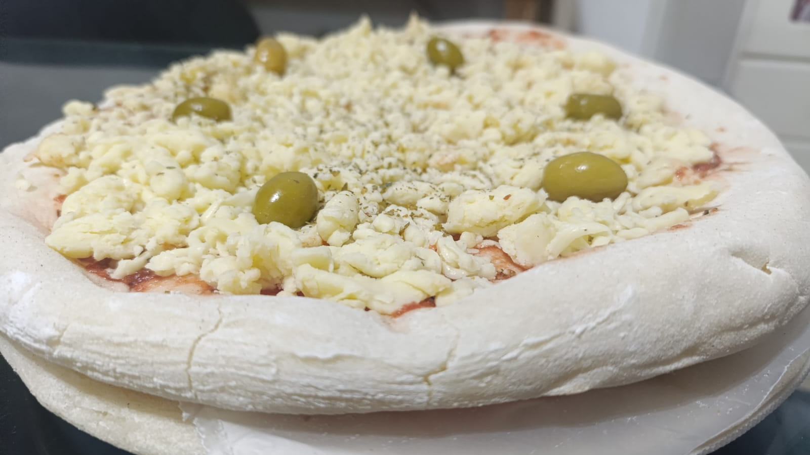 Pizzas listas para hornear