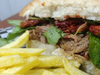 2 sandwiches de bondiola Mondello chicos + papas fritas