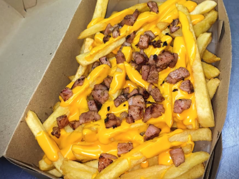 Porcion de papas con cheddar
