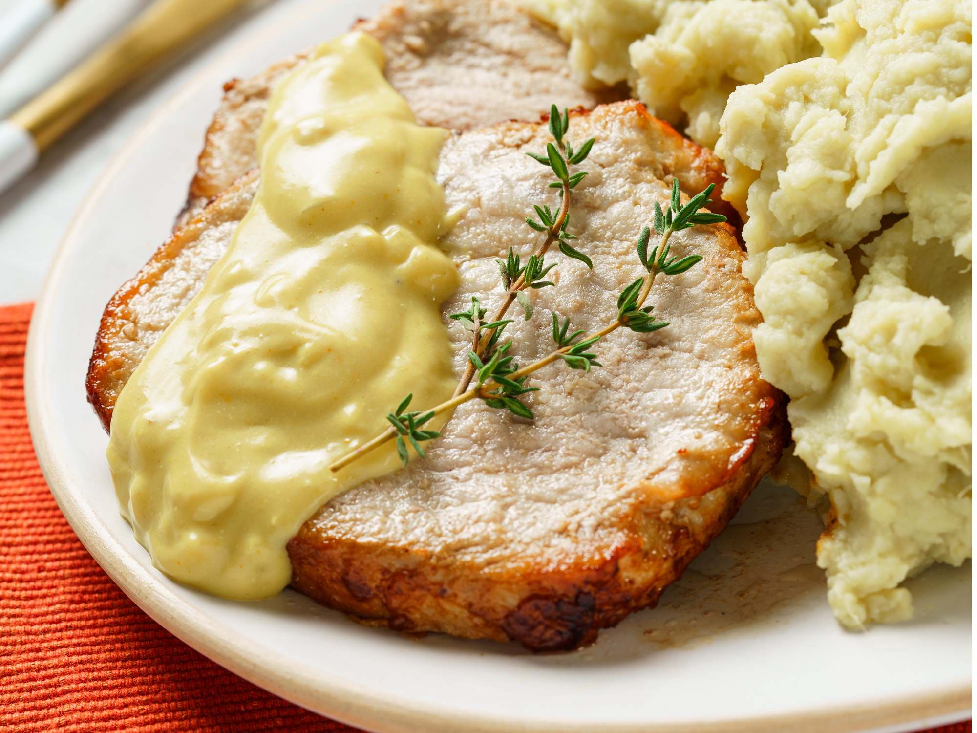 Carre de cerdo con puré de batatas - 300 g