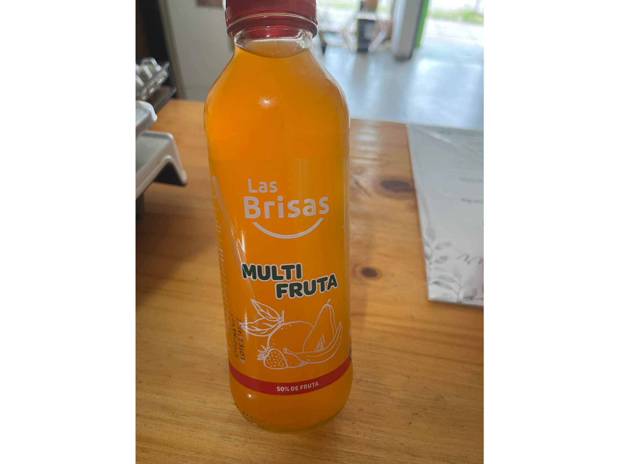 Jugo multifruta naranja y pulpa de pera