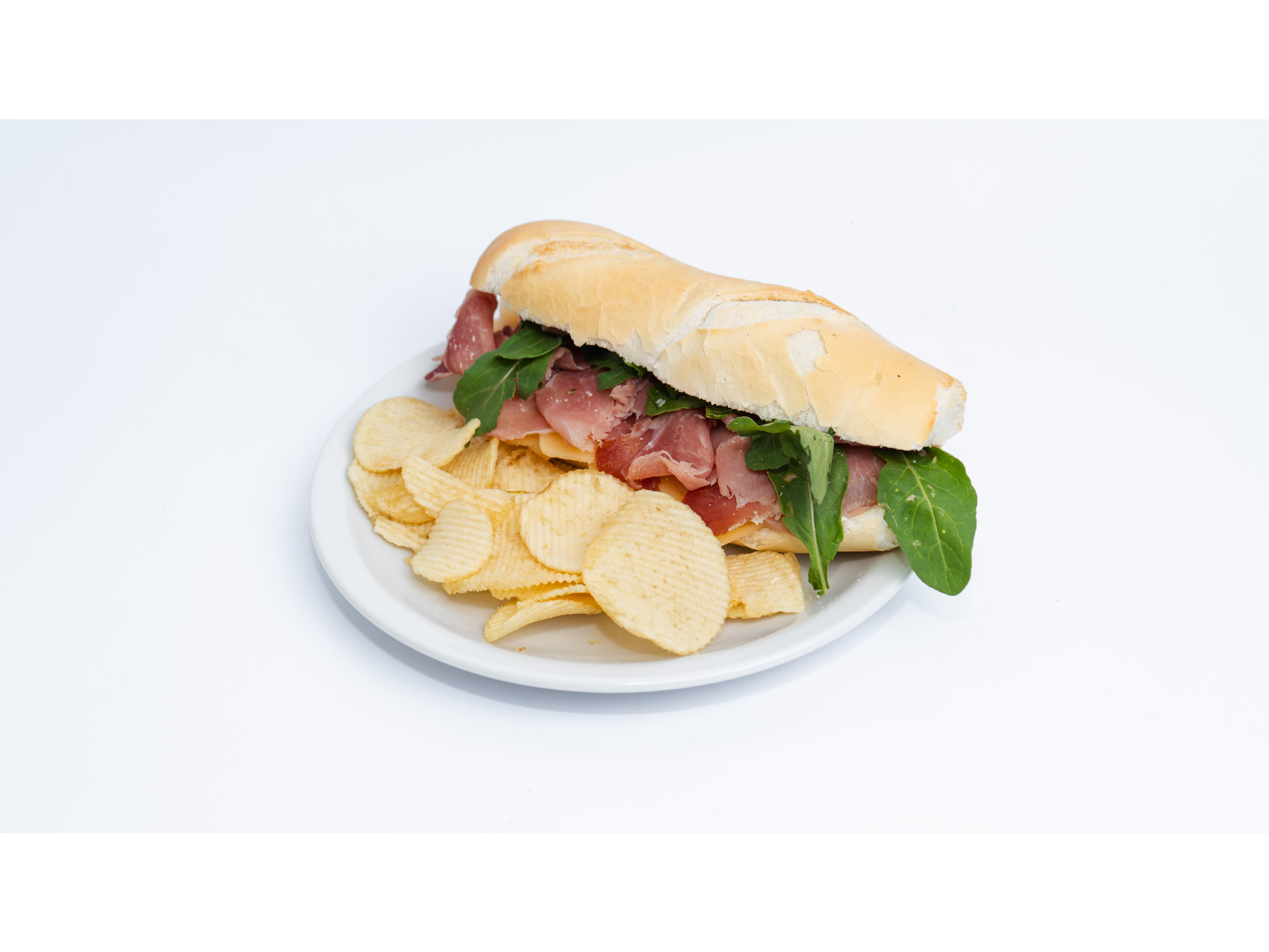 JAMON CRUDO, RUCULA, TOMATES HIDRATADOS Y PARMESANO