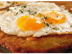Milanesa a caballo de panther bar
