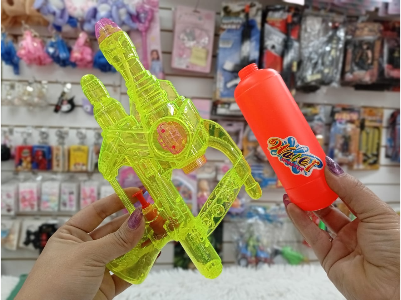 PISTOLA DE AGUA 30cm. TRANSPARENTE EN BLISTER/BOLSA - COD.: 007