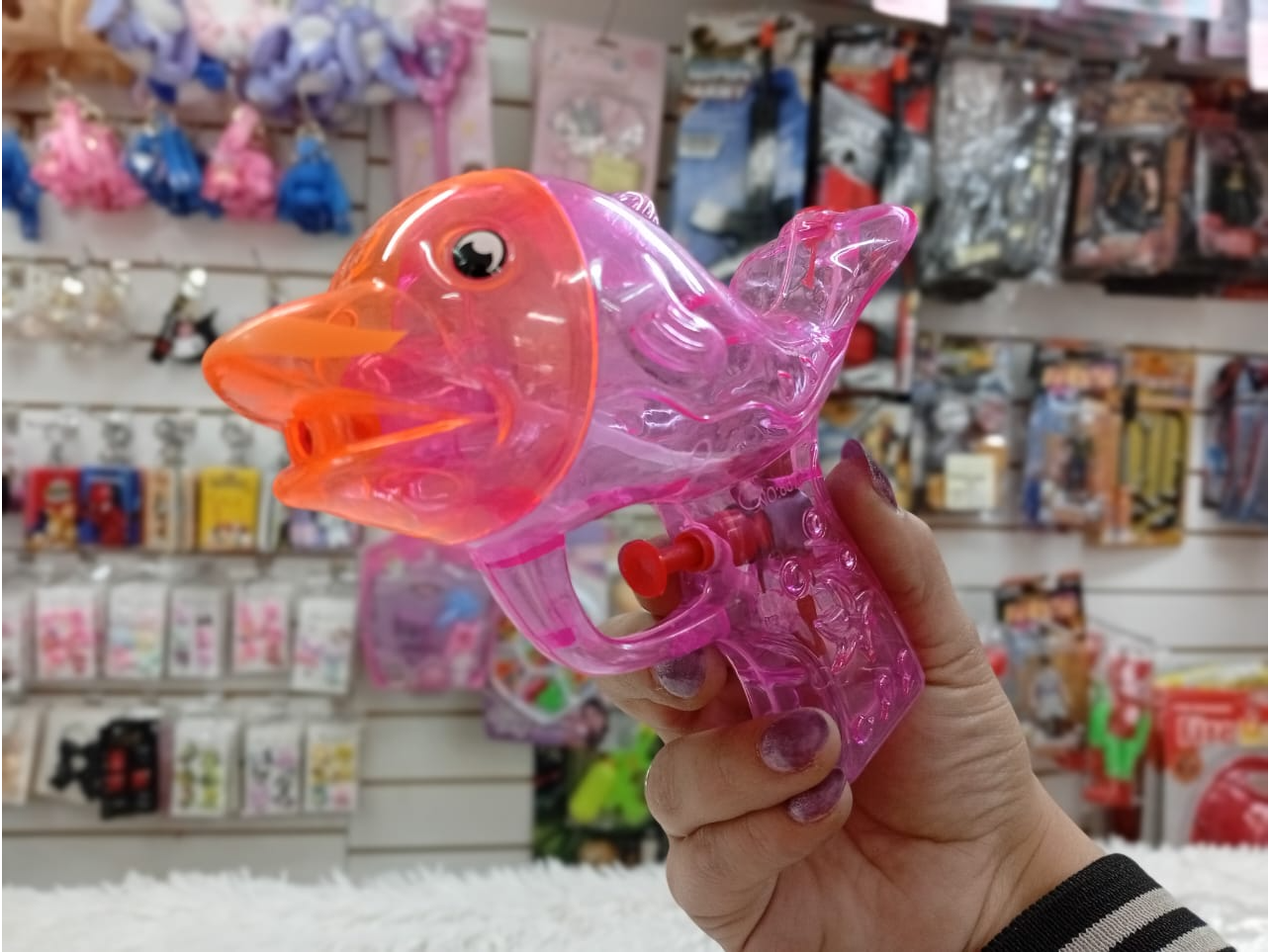 PISTOLITA DE AGUA PECESITO TRANSPARENTE BOLSA COLGANTE - COD.: 009