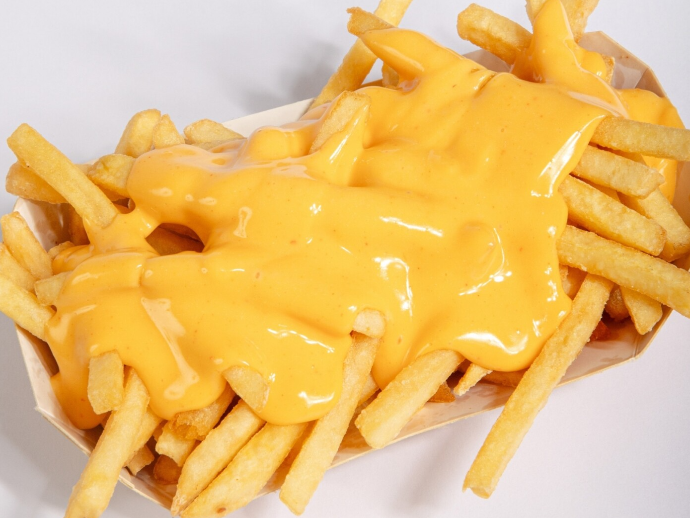 Papas fritas con cheddar
