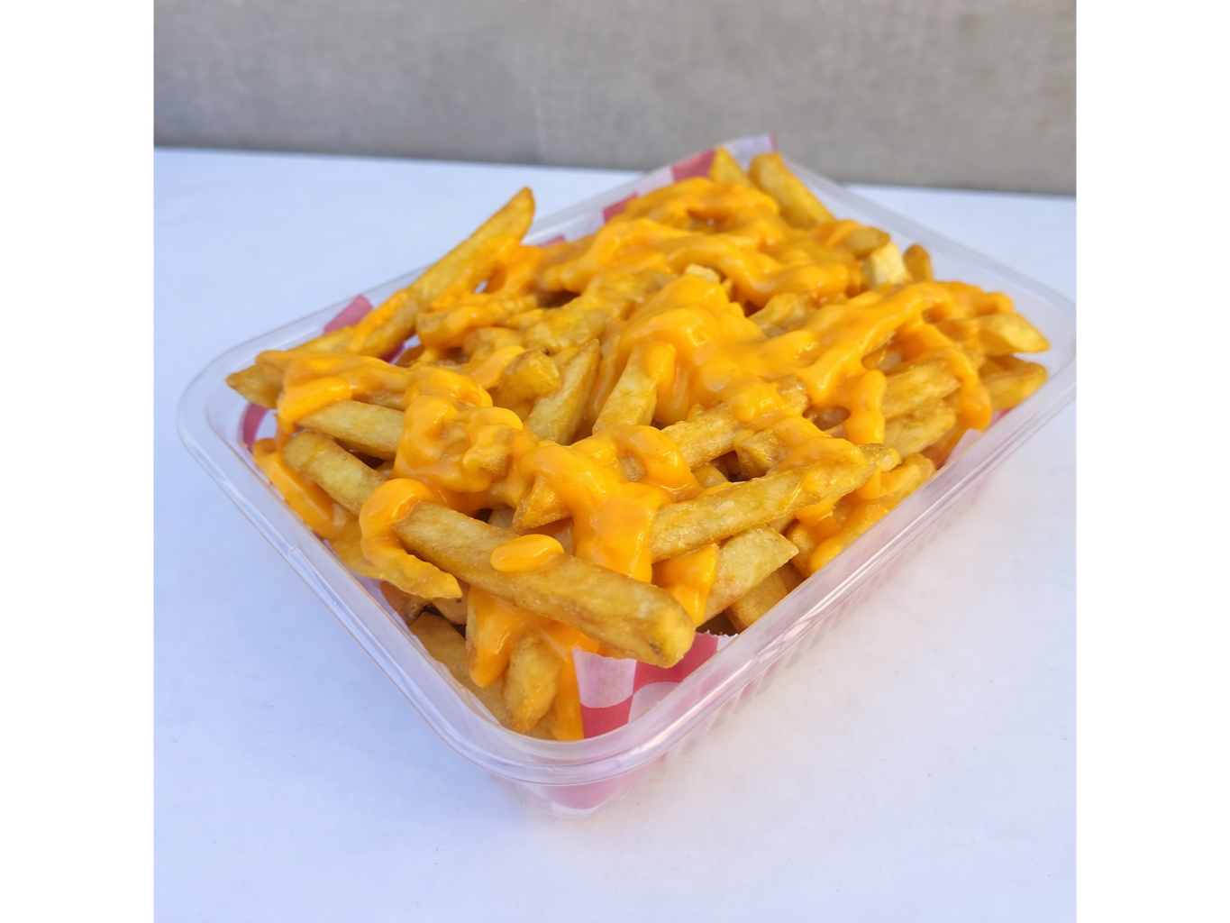 Papas fritas con cheddar chicas