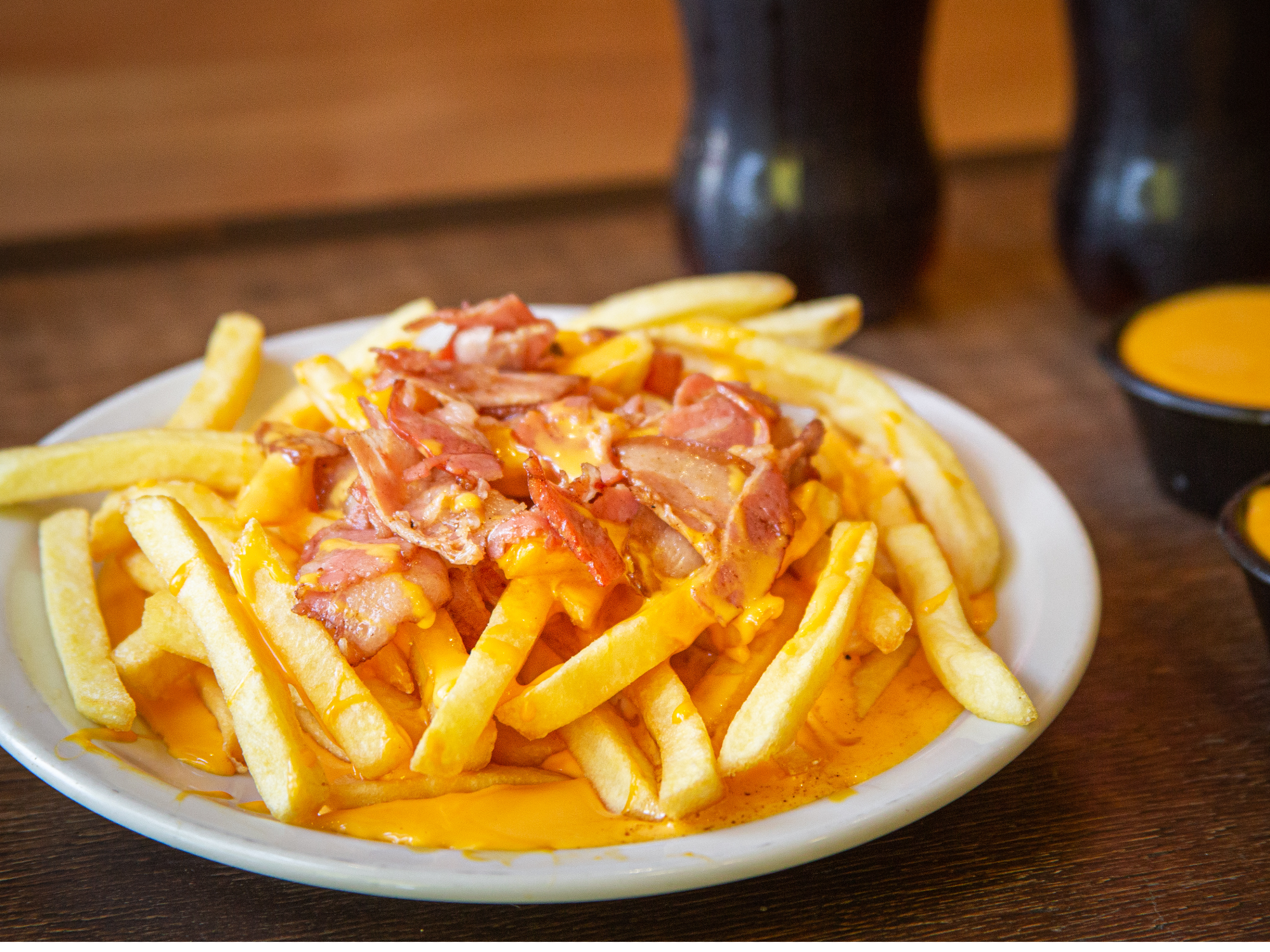 PAPAS CON CHEDDAR Y BACON