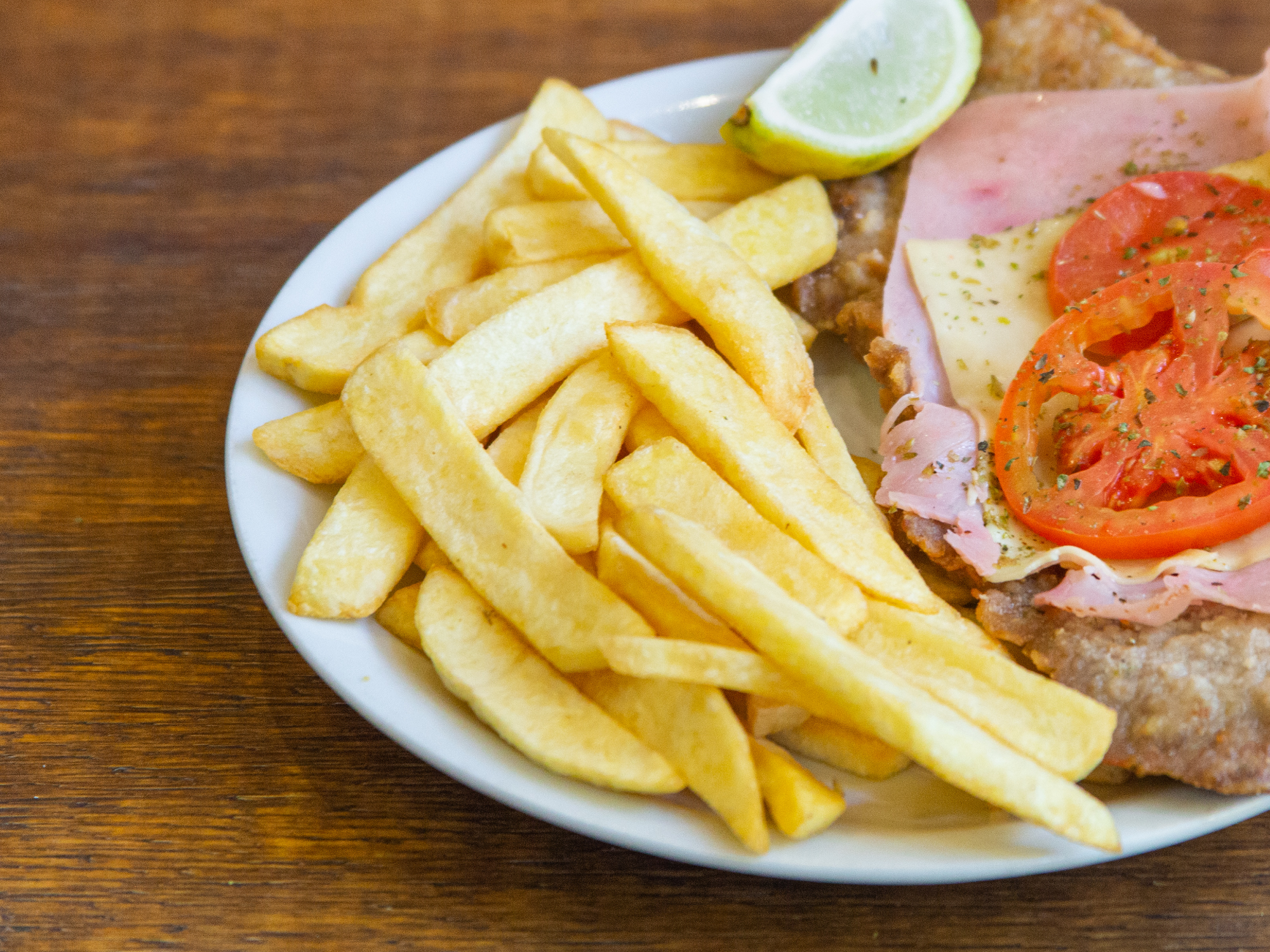 MILANESA A LA NAPOLITANA DE POLLO + GUARNICIÓN