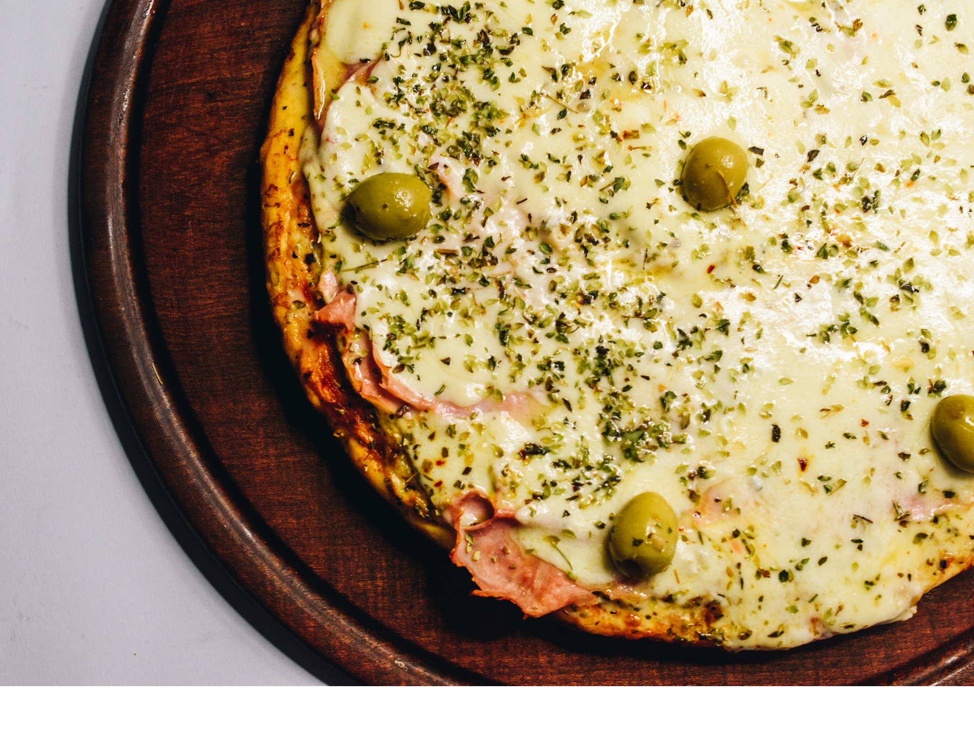 Pizza muzzarella y jamón