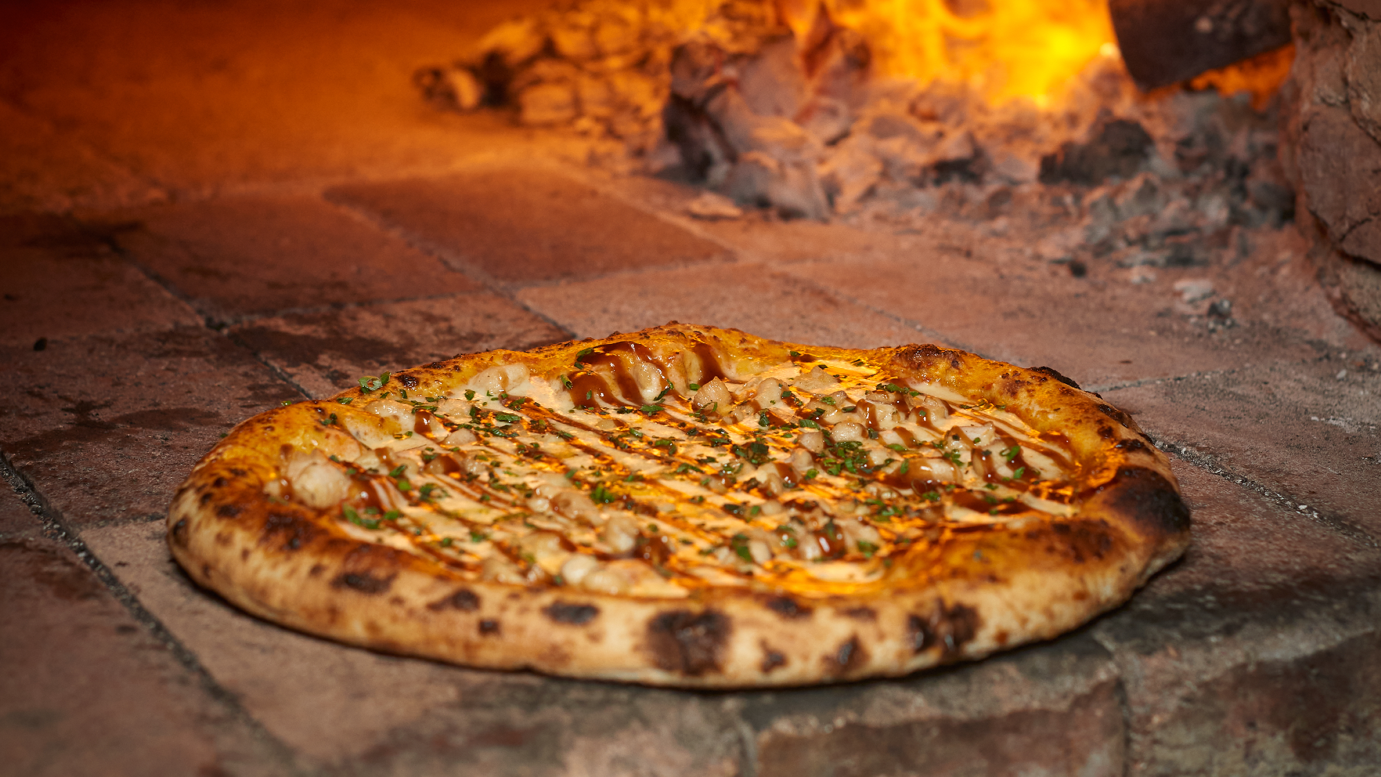 Pizzas al horno de barro