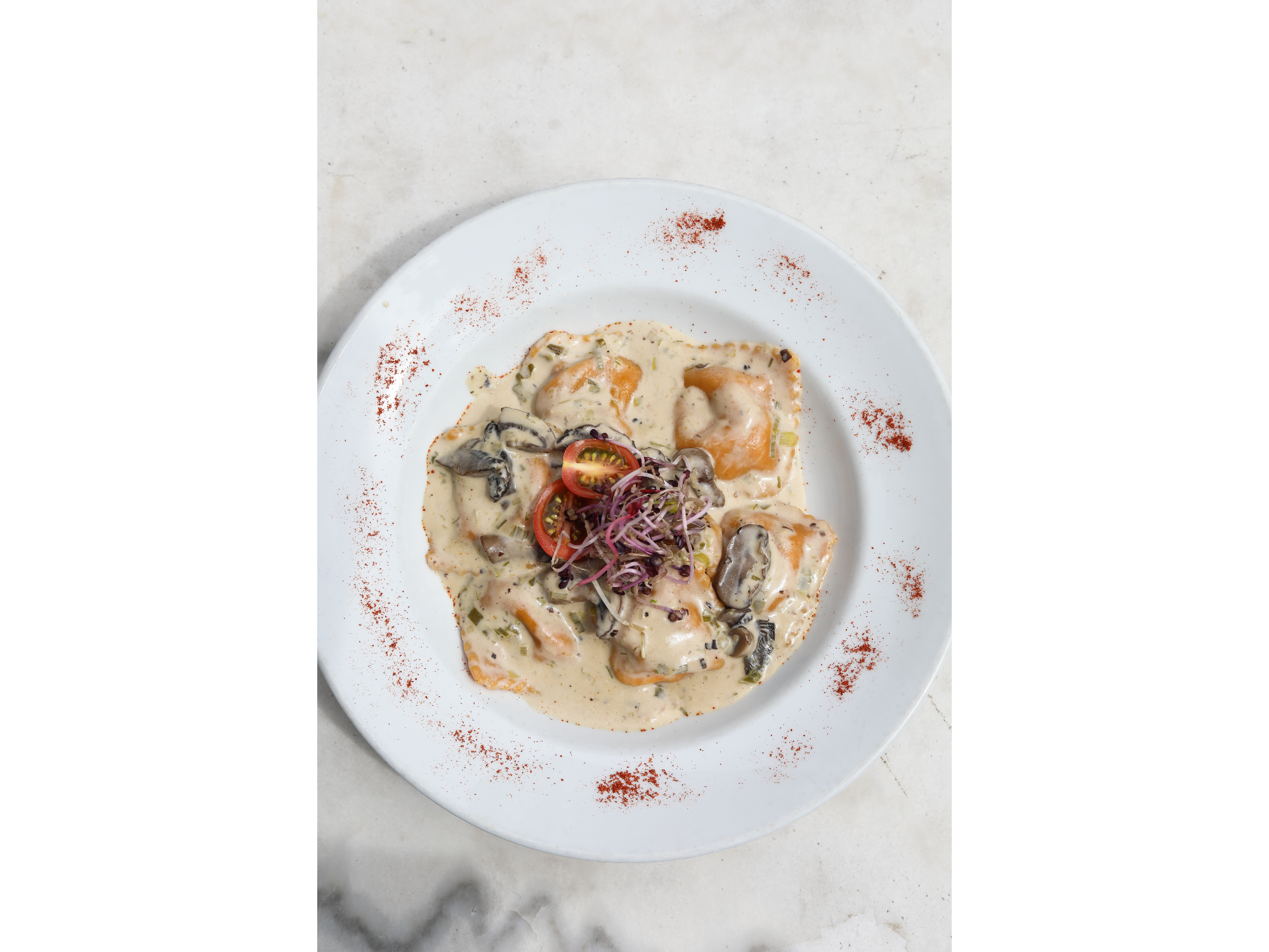 Ravioli Di Cordero Al Sugo Di Funghi.