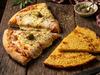2 PORCIONES DE MUZZA + 2 PORCIONES DE FAINA