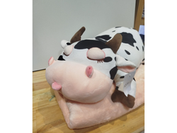 Peluche con manta - vaquita dormida