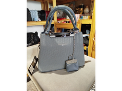 Cartera c/charm