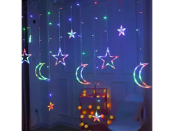 Luces navideñas estrellas y lunas multicolor