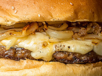 Hamburguesa Zapping Con Cheddar y Cebolla