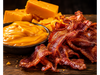 Agregado de chedar y bacon a las papas